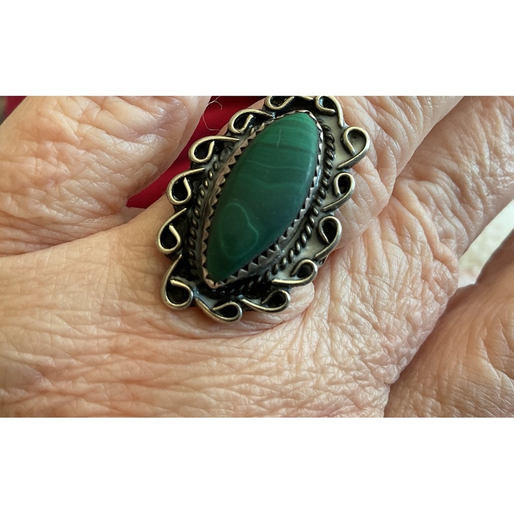 Silver ring with green turquoise?